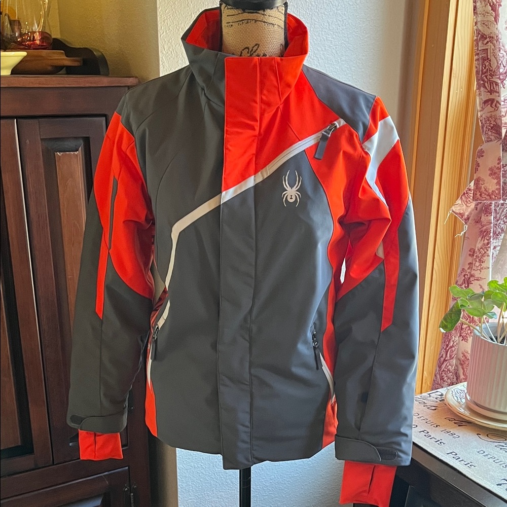 Boy’s Spider gray, orange & white ski jacket. Size 14.